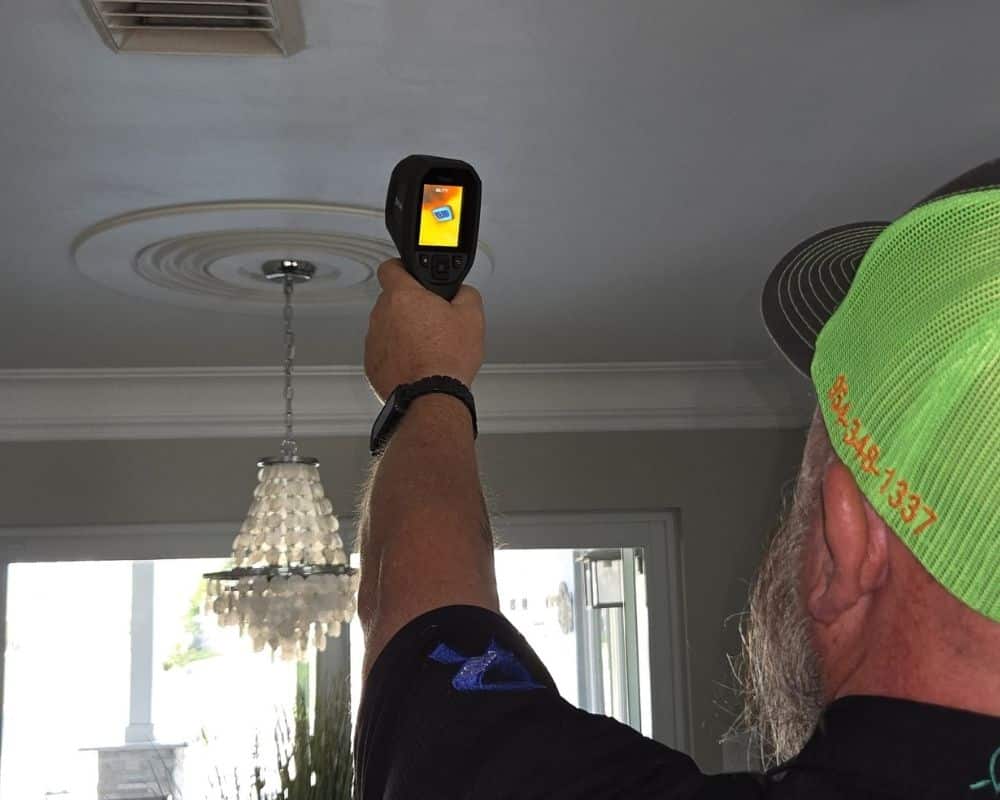 Steve from Absolute Property Inspections taking thermal images